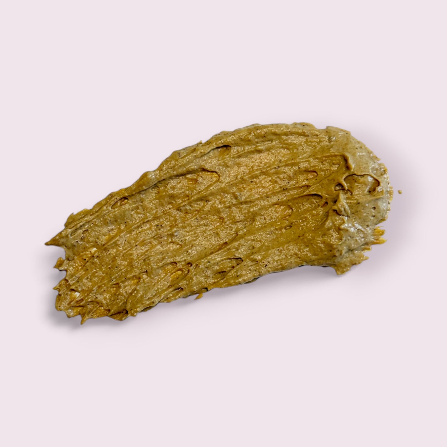 smear of officially over pumpkin enzyme mask showing the texture of the mask