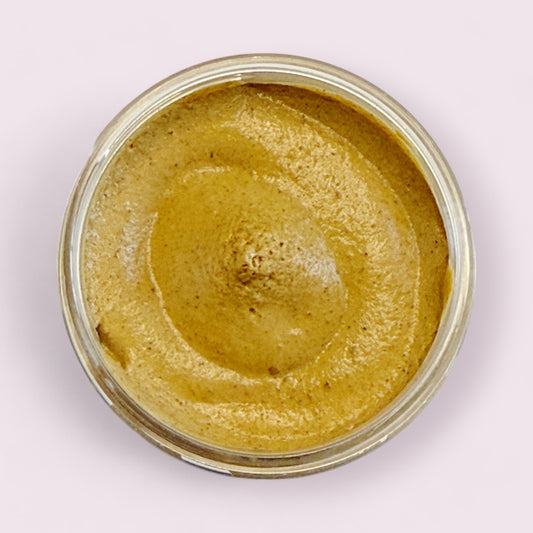 open jar of officially over pumpkin enzyme mask showing mask inside